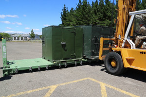 Loading a second tricon container onto flatrack