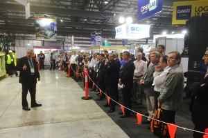 Sea Box International's managing director Shaun Moore addresses the audience during a CROWS demonstration at CeMAT 2015